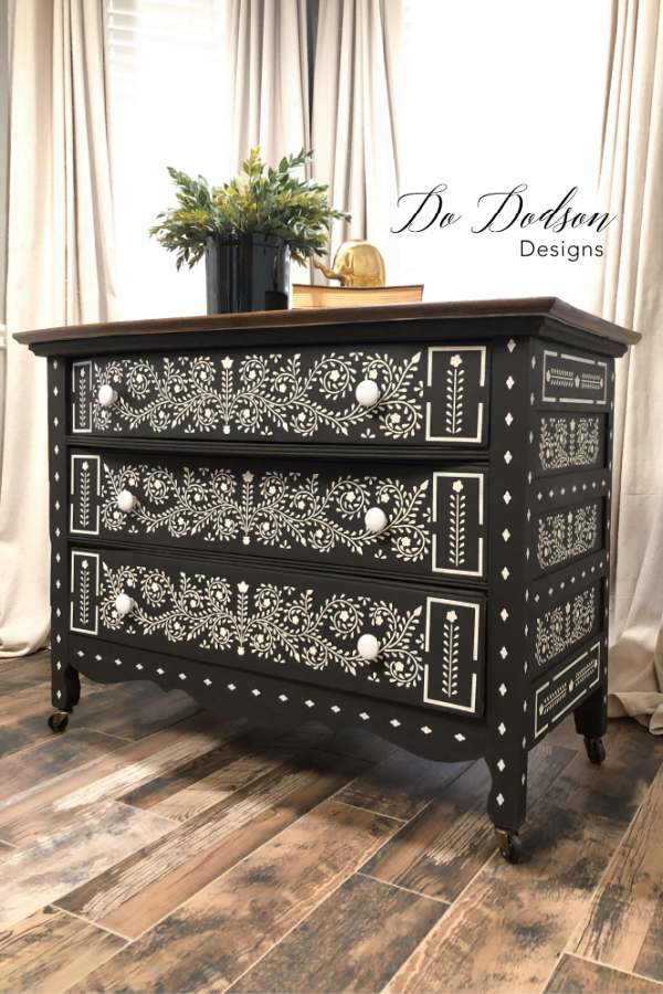 This DIY Bone inlay dresser is stunning painted in black and white. It blends well with my neutral decor.