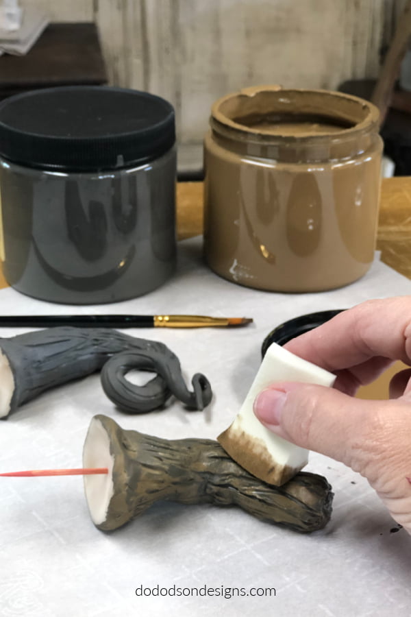 With a watered down paint, I used a makeup sponge to create the layered, mottled look on my pumpkin stems.