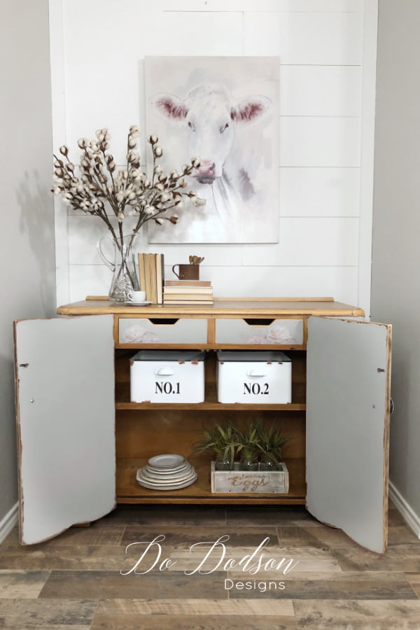 The inside of this buffet server table got a makeover too with chalk mineral paint and furniture transfers.
