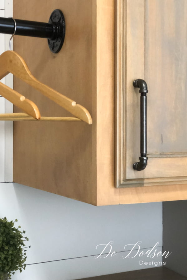 Industrial hardware was the perfect choice on my new cabinets that were installed when we did our laundry room makeover.