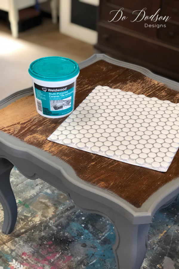 These penny tiles are going to look great on the top of this pie table.  