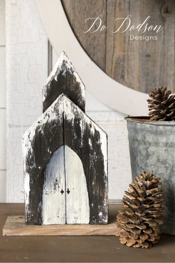 Even the back of this DIY wooden church is cute. It's a two sided craft project!