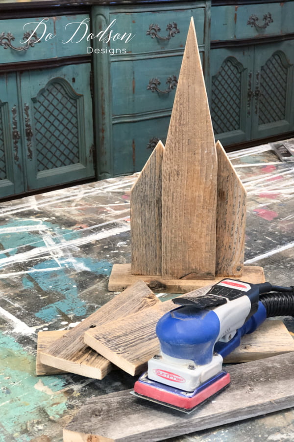 Before assembling the wooden churches, I gave the reclaimed wood a good sanding to remove any rough edges.