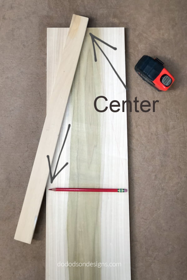 Find your center and draw a line to the point where you want the roof line to stop and repeat on the other side. 