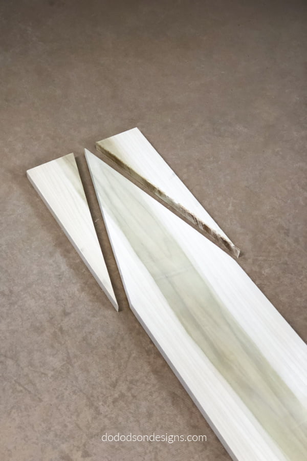 Cut from the center of your board to create the roof line of your DIY wood church.
