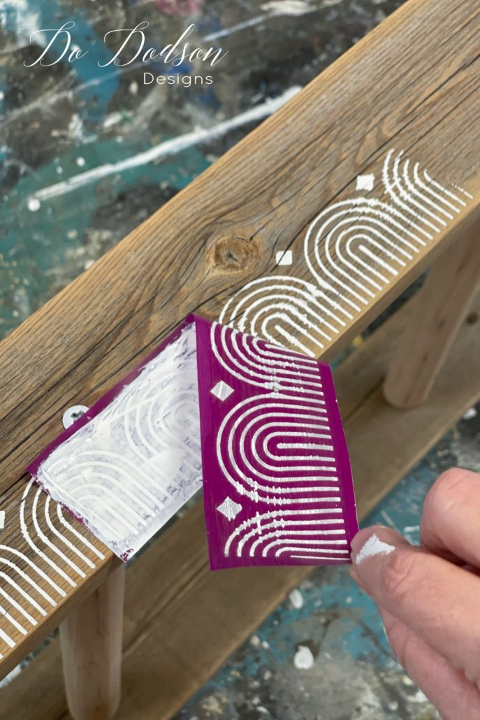 Remove the silkscreen stencil immediately after the application of chalk mineral paint. Rinse the silkscreen stencil in water and dry well. Repeat the design if needed.