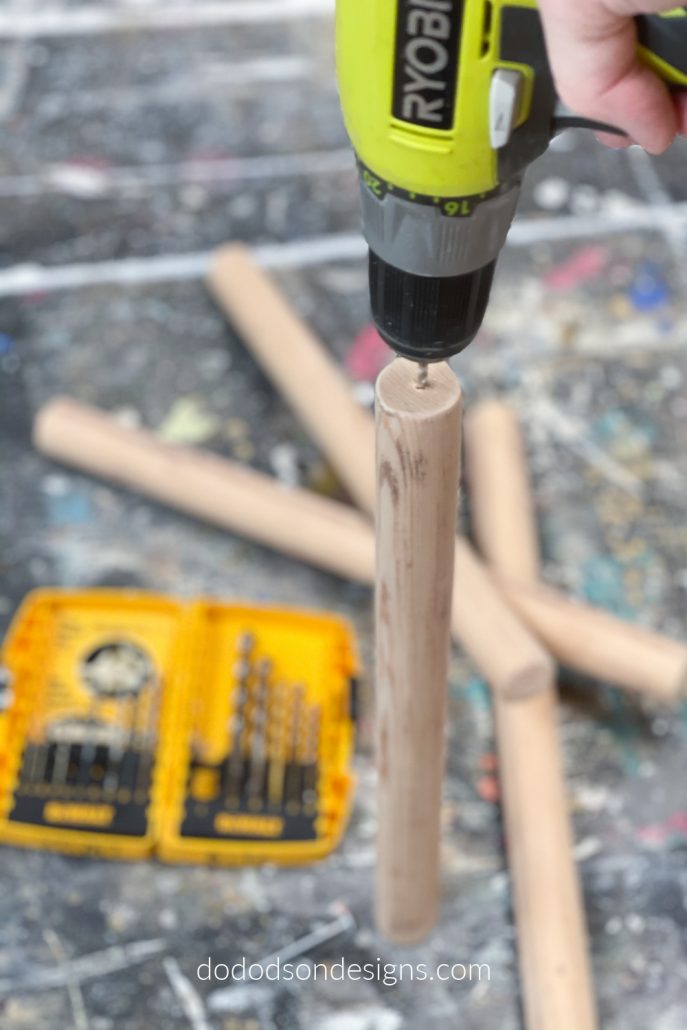 Predrill the holes in the center of the rungs with a drill bit a size smaller than the screw. This will ensure that the wood screw has a tight fit in the wood and makes the blanket ladder strong and sturdy.