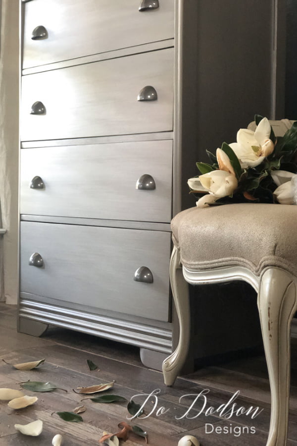 A metallic paint finish is a beautiful way to update and refurbish vintage furniture. This color is called Steel Magnolia by Dixie Belle Paint Co.