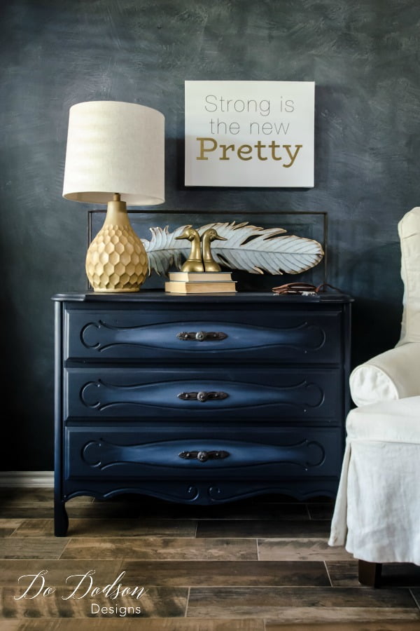 In the navy is an amazing deep shade of blue by Dixie Belle Paint. Chalk paint never looked so good on this refurbished dresser.