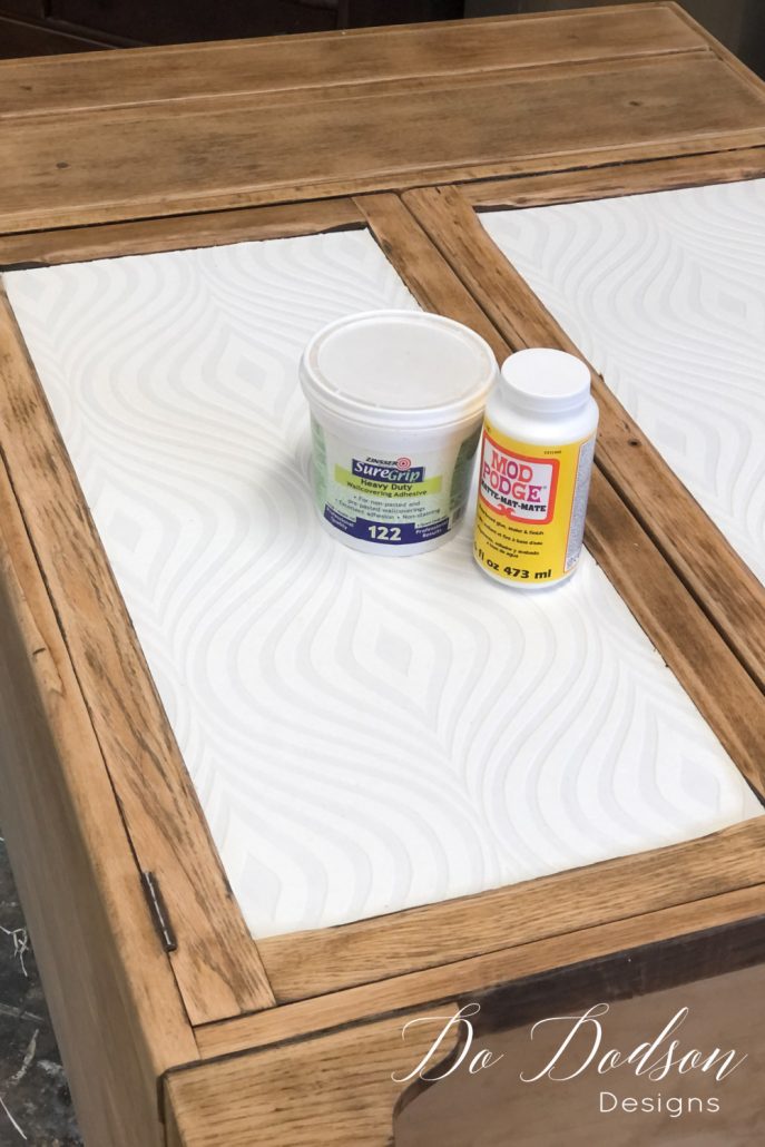 I like adding paintable wallpaper to cabinet dressers like this one. The recessed areas on the doors are perfect for this update. It's an easy DIY furniture makeovers.
