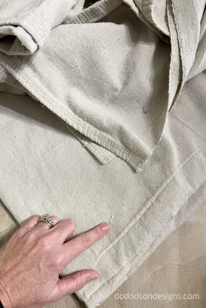 DIY Drop cloth curtains are by no means perfect but do add an earthy organic feel if you love the farmhouse style.