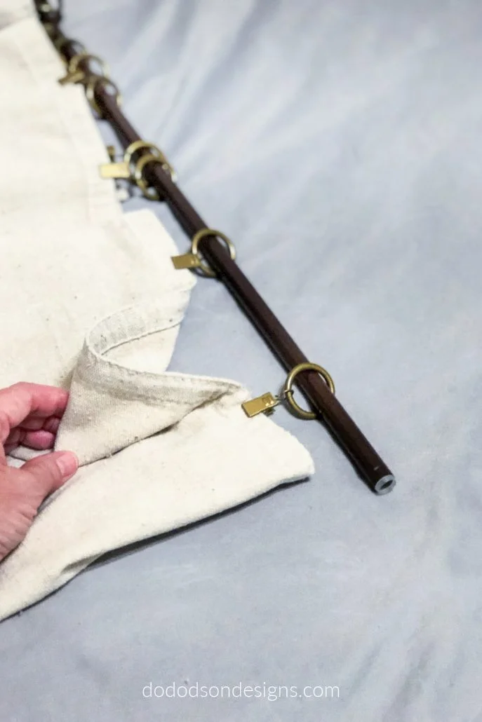 Curtain ring clips are the perfect option for hanging DIY drop cloth curtains. 