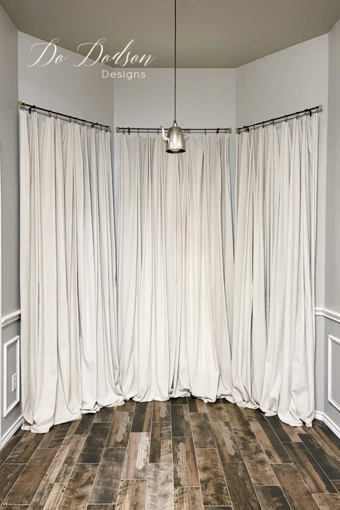 For $20 a window I made these DIY drop cloth curtains for my windows. One of the best curtain hacks ever! 