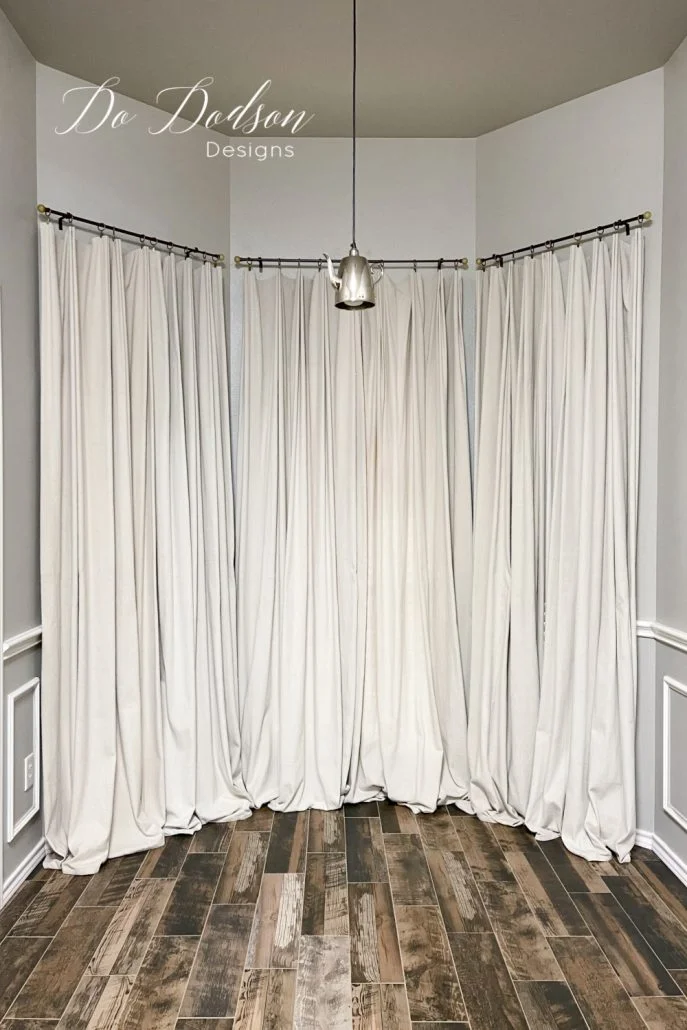 For $20 a window I made these DIY drop cloth curtains for my windows. One of the best curtain hacks ever!