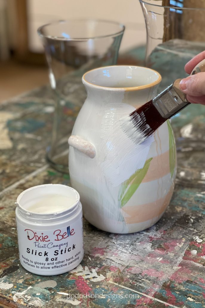 Before you can DIY Pottery Barn inspired vases, you'll need to apply a bonding primer to the slick surface. This will allow the texture and paint to adhere. 