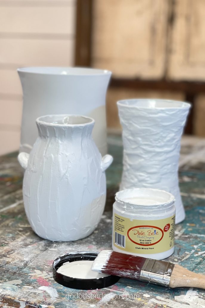 I layered 3 paint colors over my DIY Pottery Barn Vases. The color trio consists of cotton, pine cone and coffee bean chalk mineral paint.