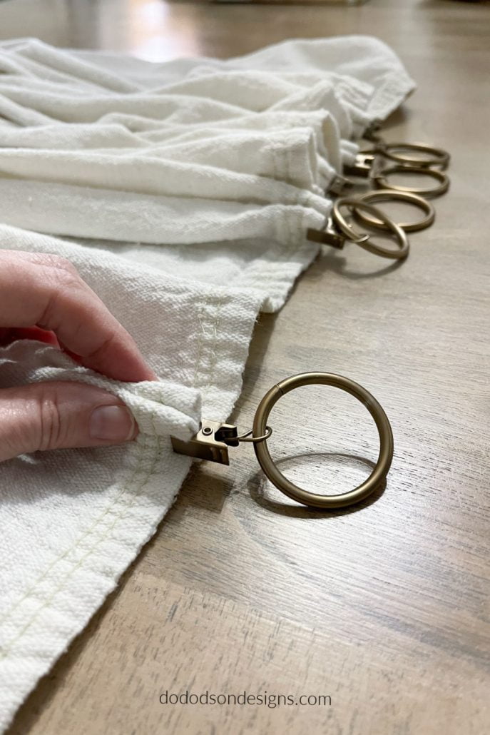 I added pleats to my DIY drop cloth curtains using curtain ring clips. 