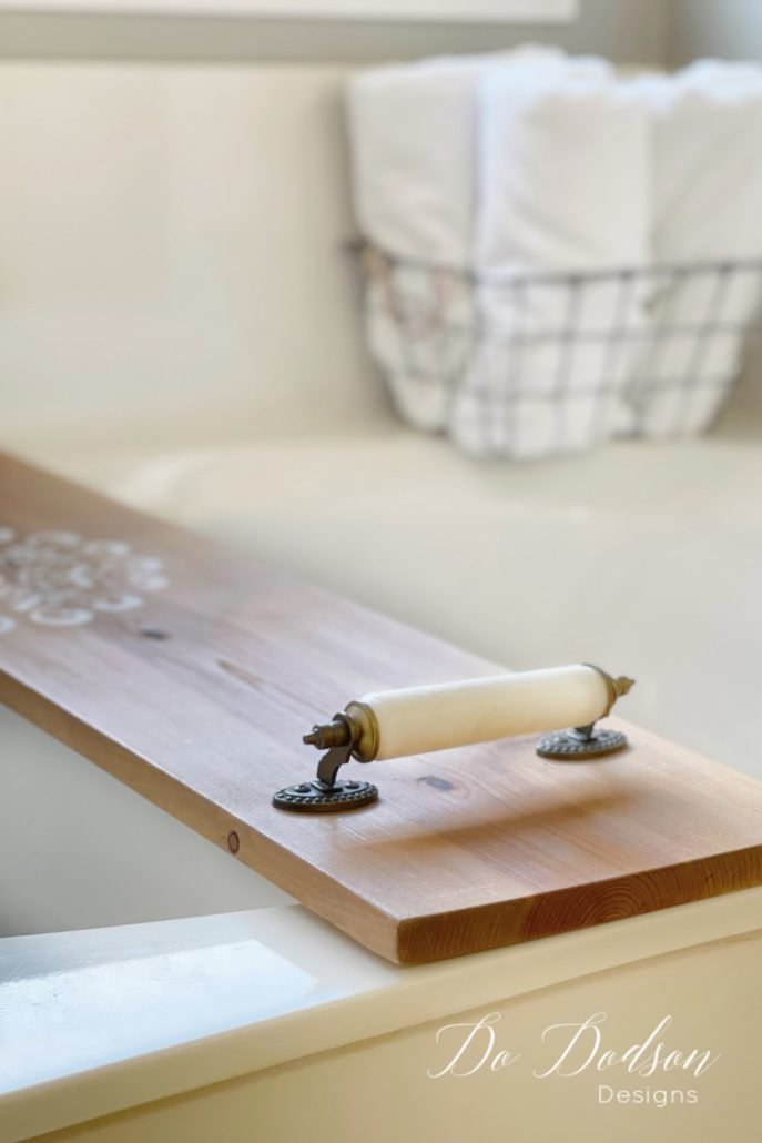 Try this 1 board bathtub caddy... it was the easiest project ever! Add some cute Hobby Lobby handles, and you have money in your pocket. $$$
