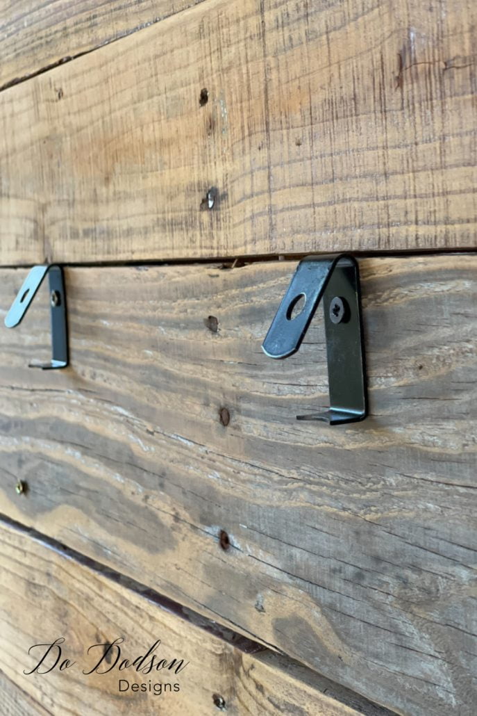 These clay pot clips are perfect for hanging plants on a wall.