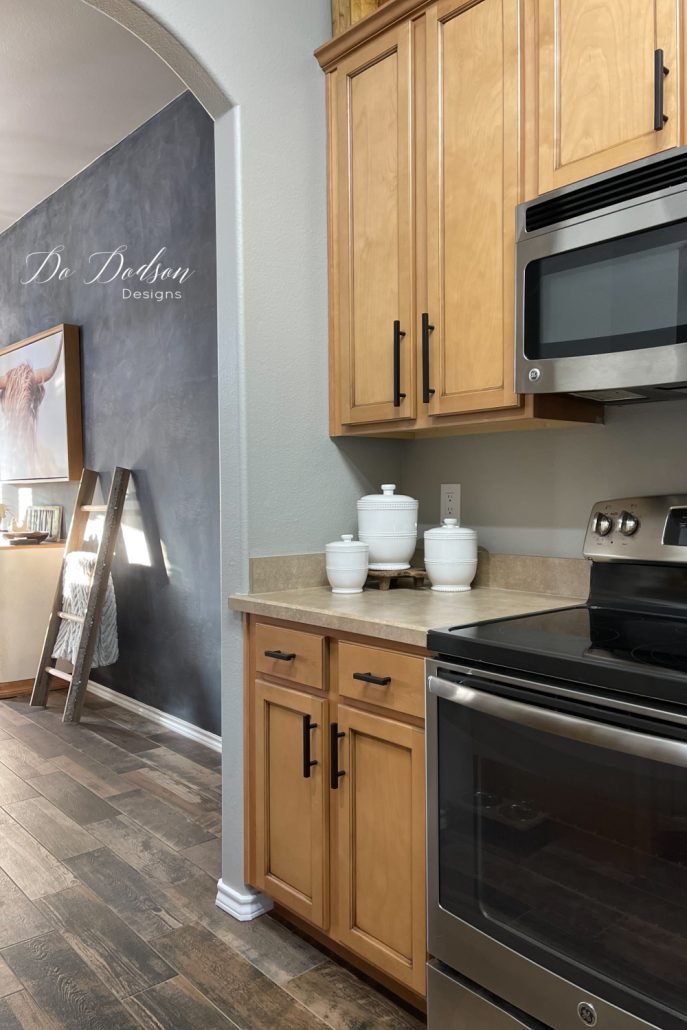 I changed out my kitchen cabinet hardware for less than $60. These black modern pulls are the perfect look for your modern farmhouse.