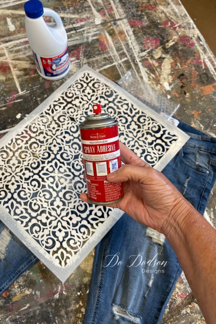 I used a spray adhesive for the stencil to give me a crisp clean line when using bleach on the stencil. The results are on jeans are amazing and super fun!