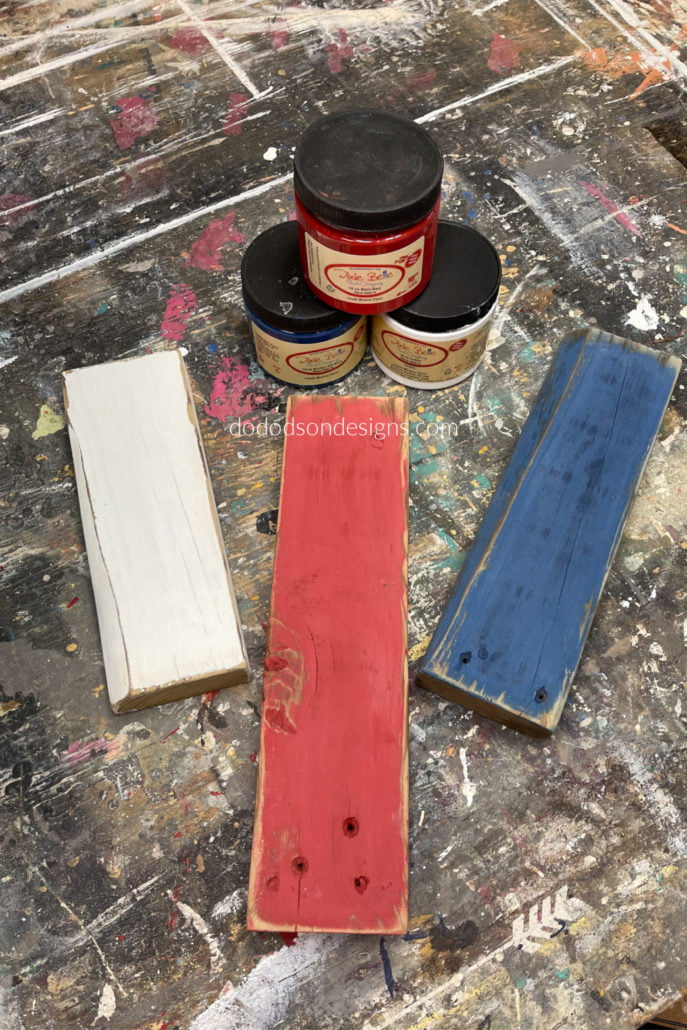 Here's is what they look like after painting and a little distressing because I wanted my wooden firecrackers to have a rustic feel.