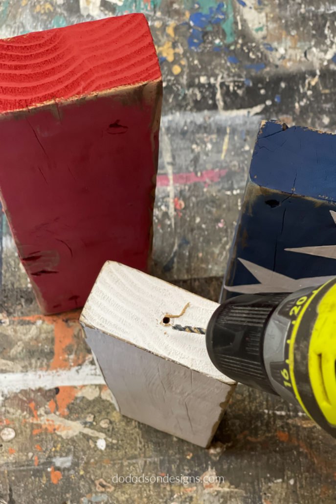 With a wood bit, drill a hole in the top of your wooden firecracker and place one end of the wire fuse inside. You can add wood glue if you like, but I didn't. It depends on the size of the hole you drill. Mine was a pretty tight fit.