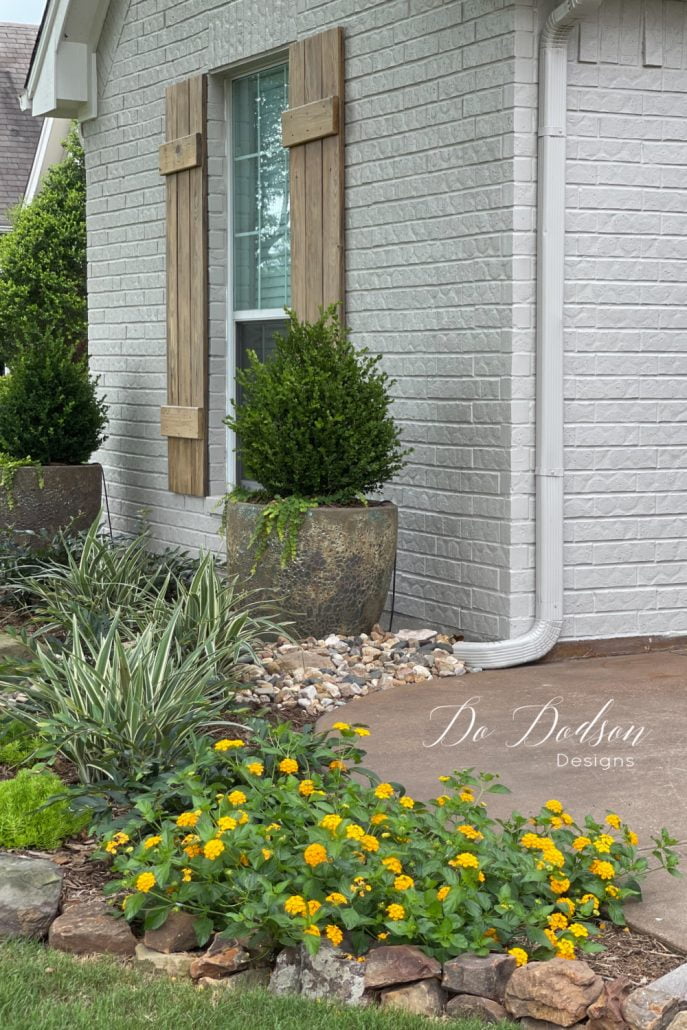 Best decision ever! See how painting red brick on the exterior of my home made it look HUGE! Check out the before and after photos.