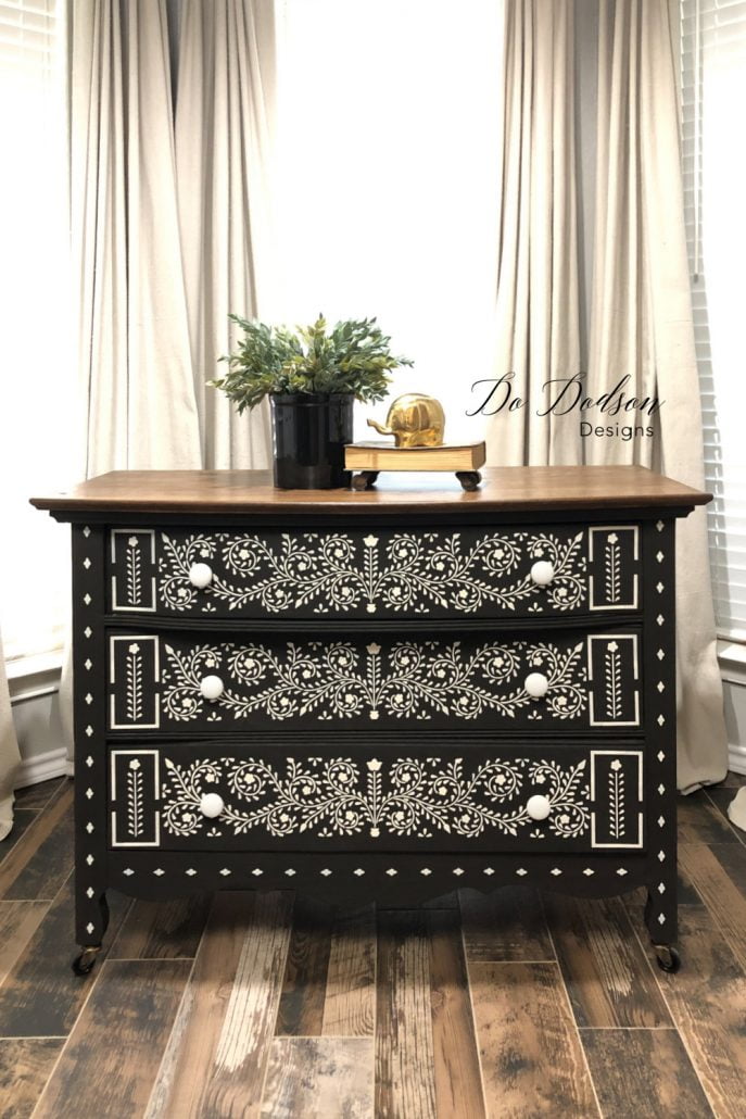 Here we have one of my favorite black-painted inspired pieces of furniture. This loveliness of stenciled art gives this dresser some real character. Learn how I did it on the blog.