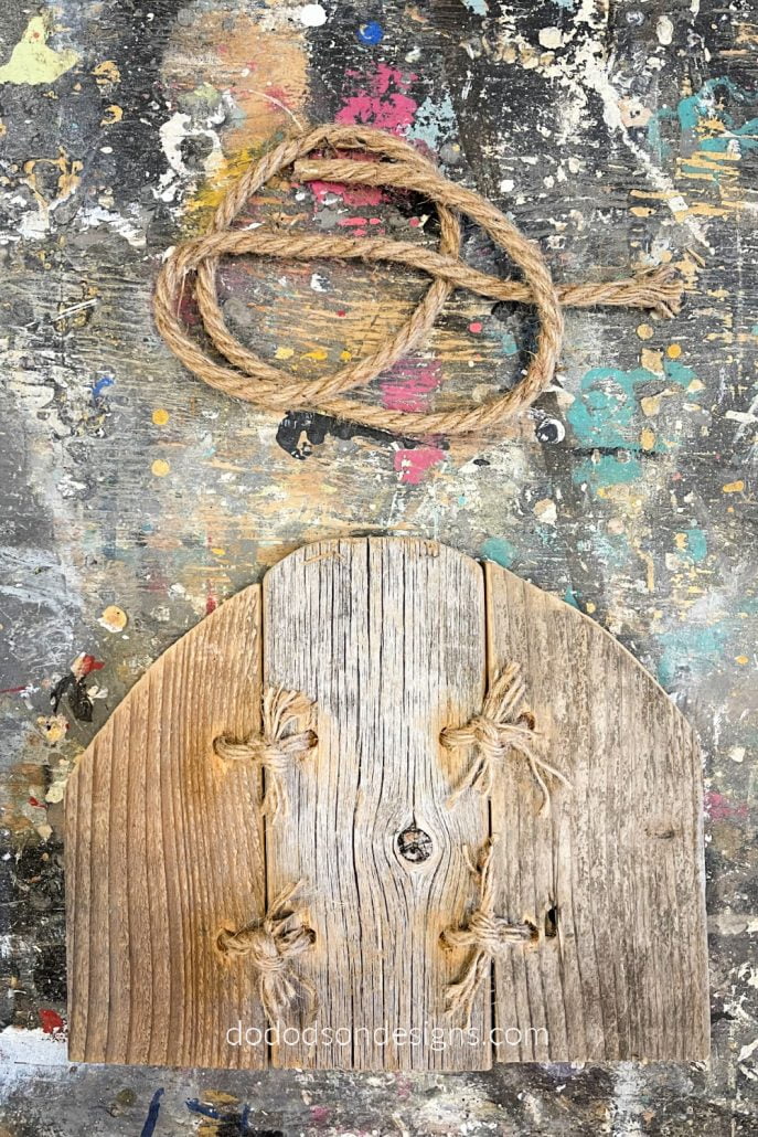 After threading the jute twin and connecting the wood pumpkin pieces together, you can paint and embellish them to match your Fall home decor style.
