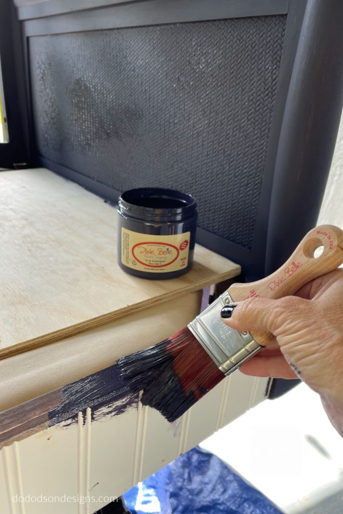 Before painting wood furniture, always clean with Dixie Belle's White Lightning to de-grease and remove debris you can't see. Scuff sand the area you want to paint with 220 grit sandpaper. Wipe away any remaining dust from sanding with a clean damp cloth before painting. Doing these steps will ensure the surface is ready to accept the paint.