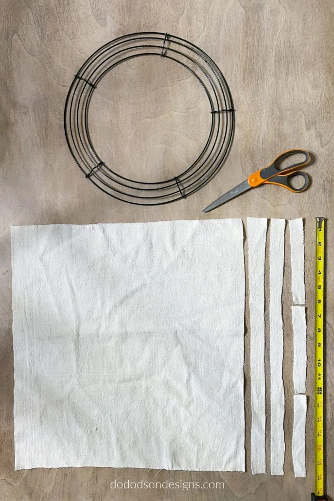 Here is everything you'll need to make a DIY drop cloth wreath. It takes less than an hour and the results are gorgeous!