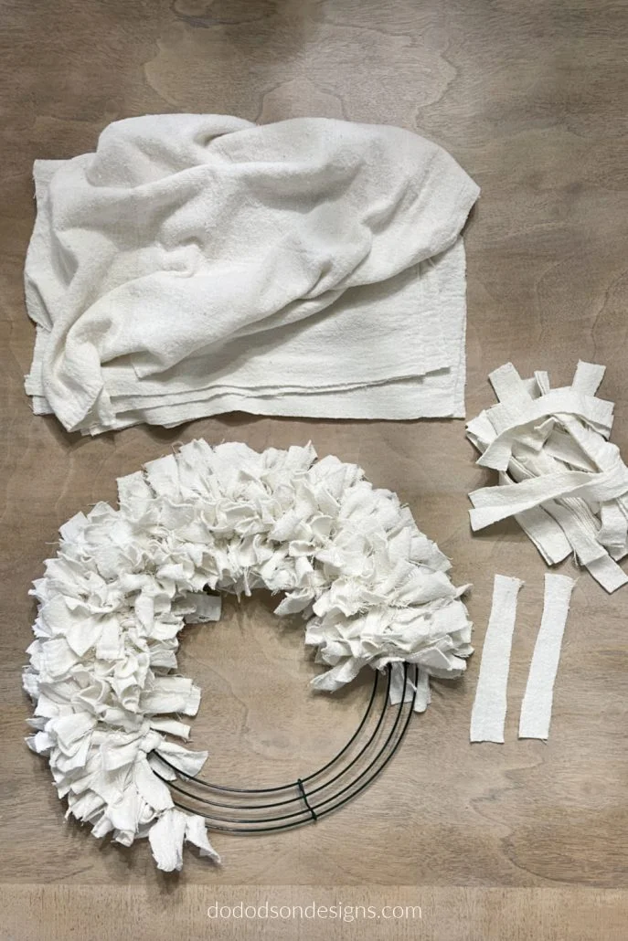 I made this gorgeous DIY drop cloth wreath in less than an hour with items I already had in my craft room. It feels so good to use up those scraps of fabric. 