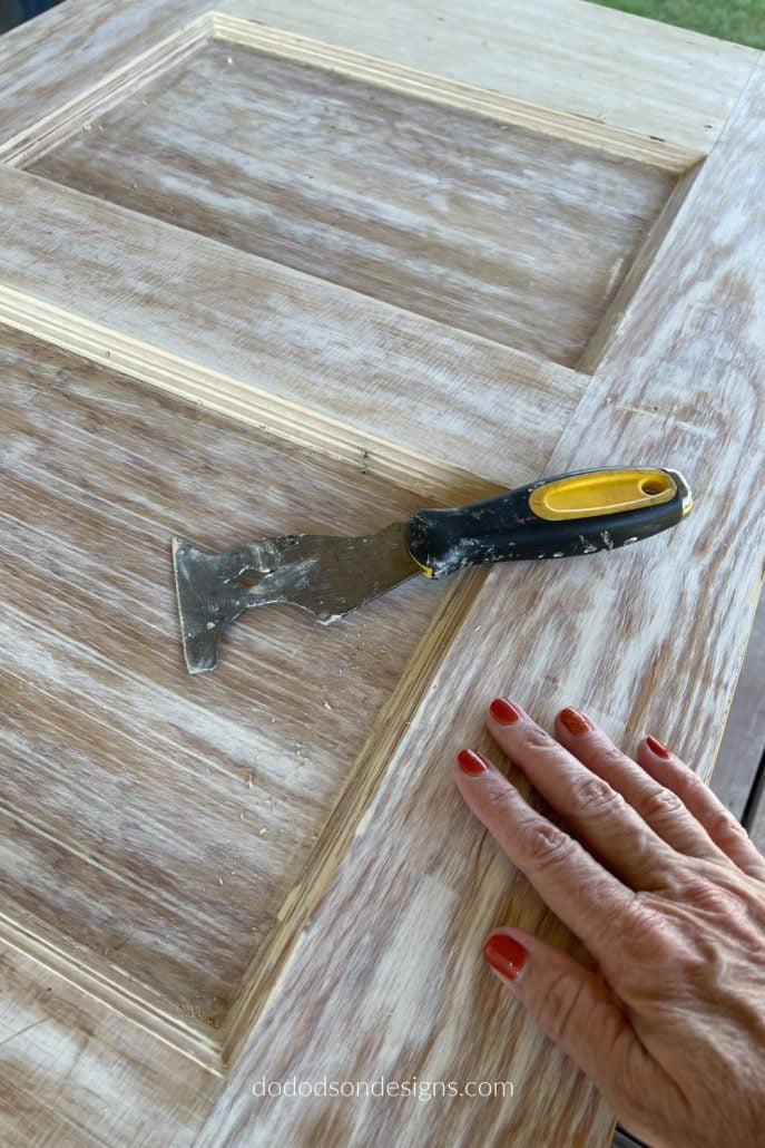 Down to the bare wood! Now with a little sanding on this old door, I'll get the look I'm after.