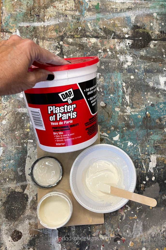 Mix one part plaster to one part paint to make a paste/icing that you can decorate your wood block Christmas trees with.