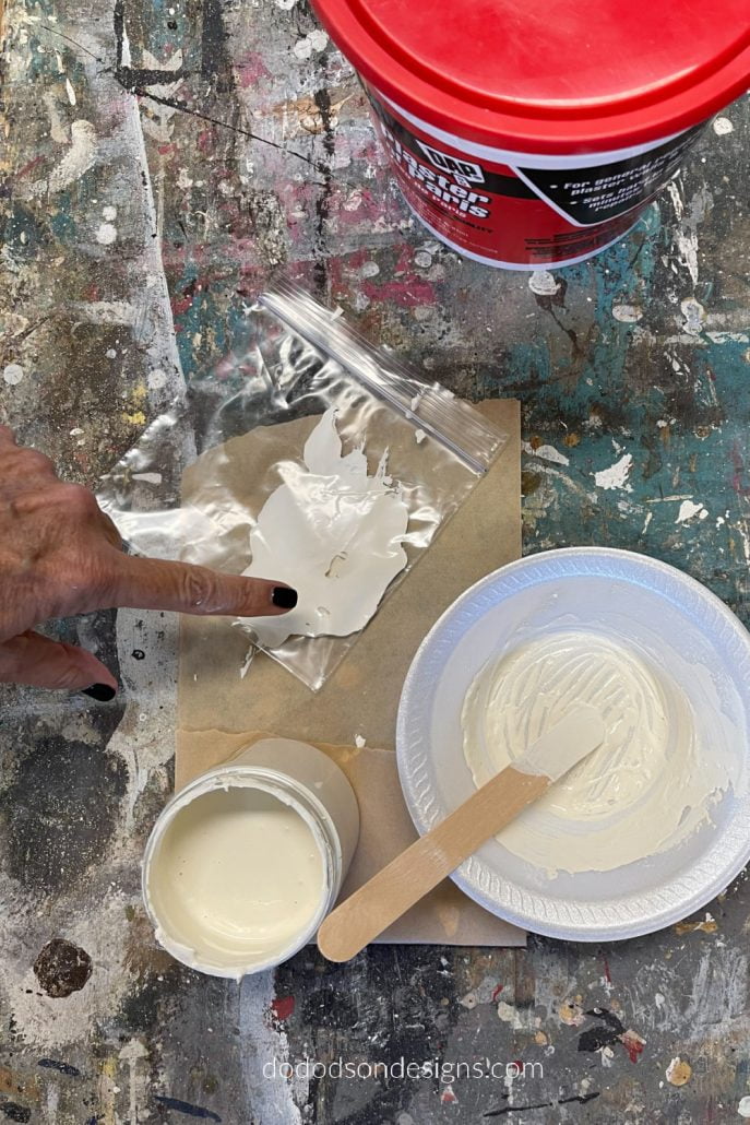 Mix one part plaster to one part paint to make a paste/icing that you can decorate your wood block Christmas trees with.