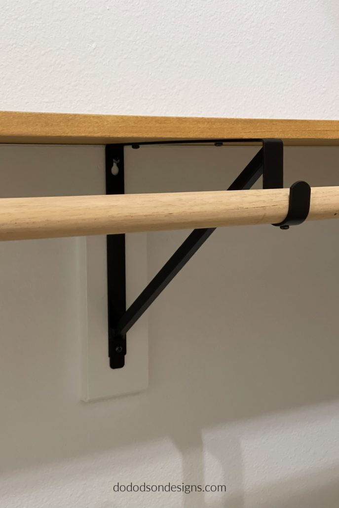 Our closet update looked amazing after installing these new black brackets.