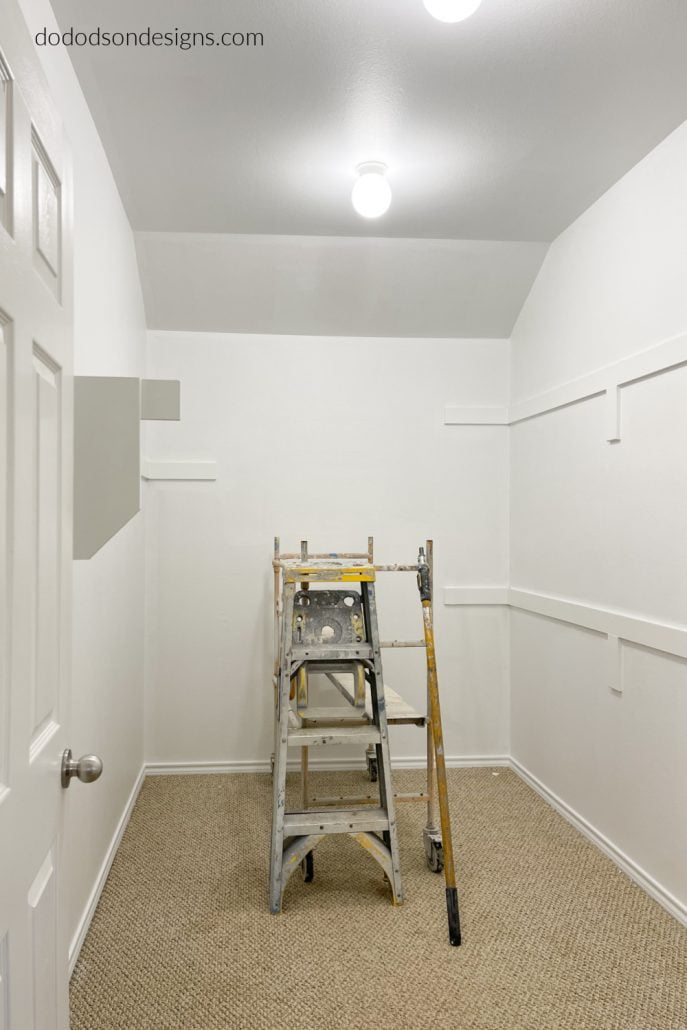 A fresh coat of paint on the walls and trim was the beginning in DIY closet update in our master bedroom. 