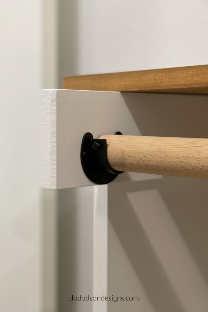 The black metal brackets gave our DIY closet update the look and feel of a new closet.