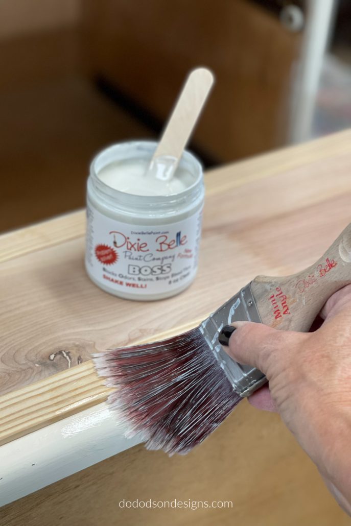Uses a good quality stain and tannin blocker like BOSS. Apply two coats with a good quality synthetic paintbrush and allow to dry before painting.  