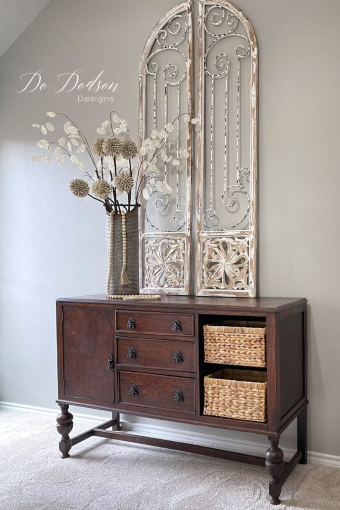 This is the newest addition to my bedroom makeover that is still in progress. I'm using this sideboard as my "new to me" dresser. That is after I eliminated the moldy, musty smell out of the dresser drawers and everywhere else.