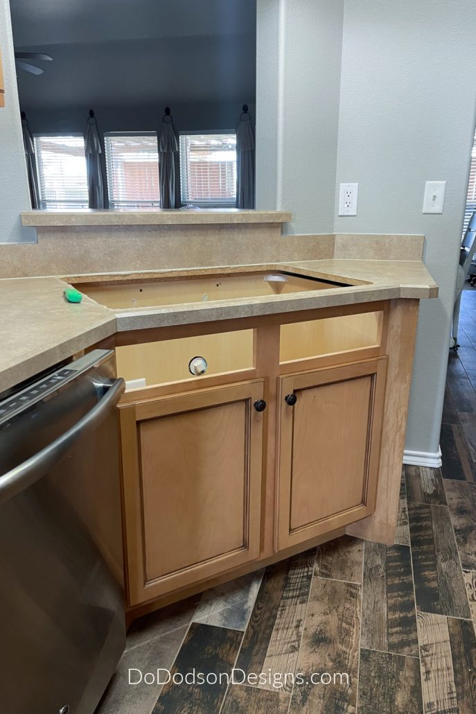 We removed the existing kitchen sink before the demo began. I can't wait to get the new farmhouse sink installed.
