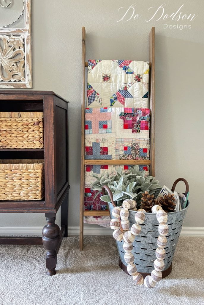 I like to hang my quilts from a leaning blanket ladder (quilt ladder) for those thinner small quilts. (lap quilts)