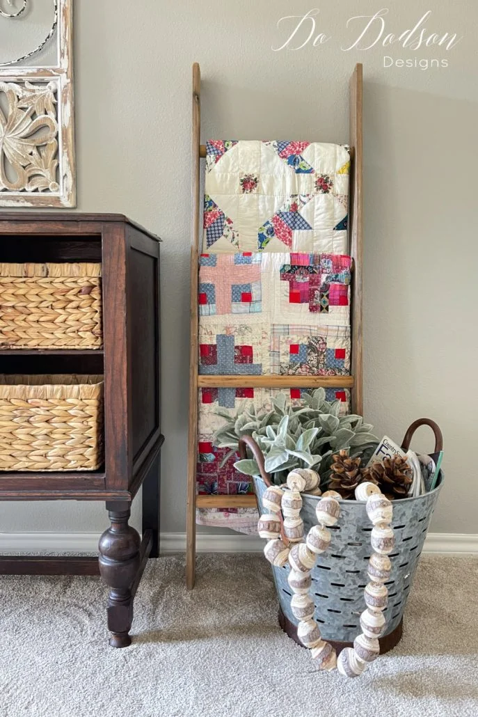 I like to hang my quilts from a leaning blanket ladder (quilt ladder) for those thinner small quilts. (lap quilts)