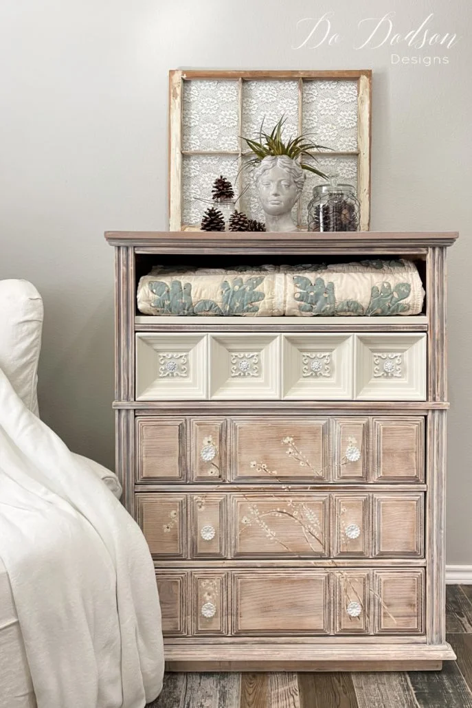 I love to tuck away quilts in unusual places for easy access. This old dresser was perfect with it's missing drawer.