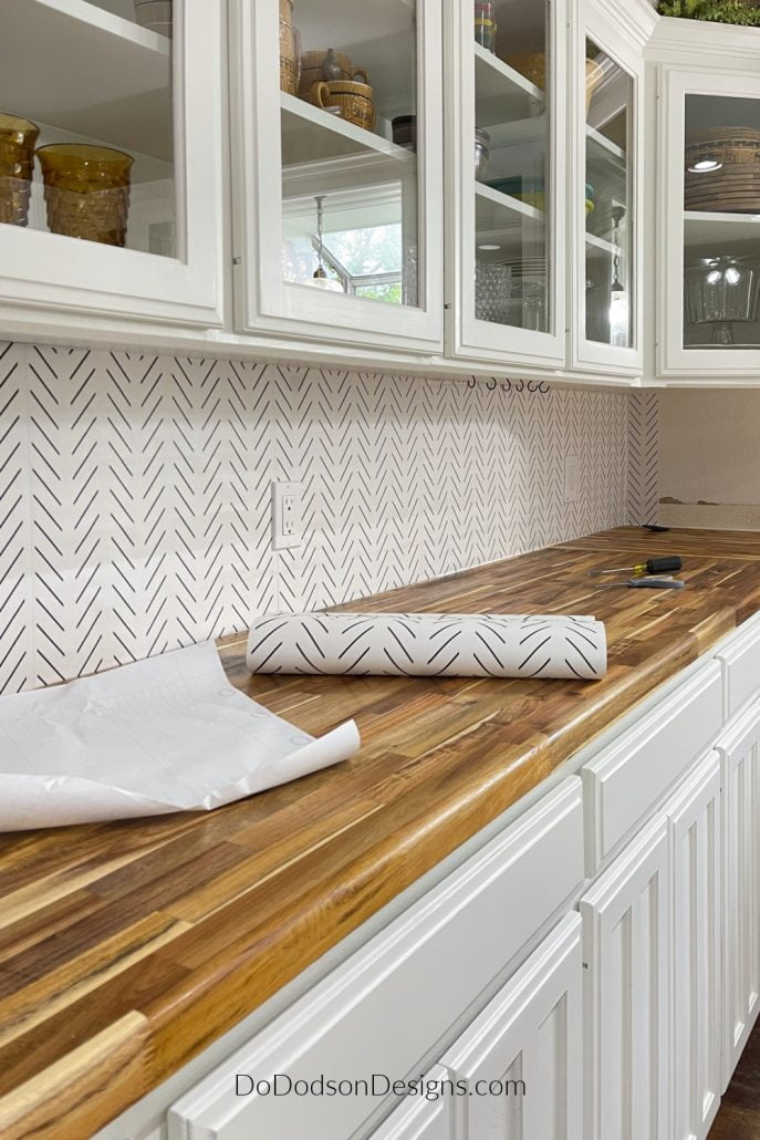 For the best and long-lasting results, it's best to have a smooth wall. Our wall is textured, but I knew this peel and stick wallpaper would be a temporary solution. But I was okay with that.