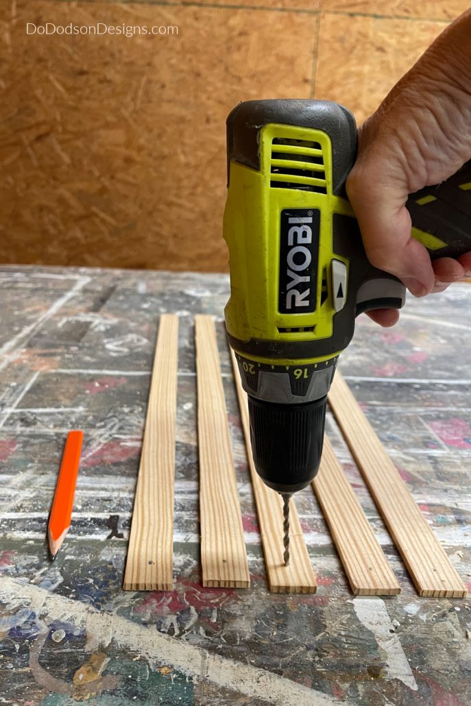 Drill holes at each end of the wood strips. Later you can secure the wooden stars together with twine or jute.