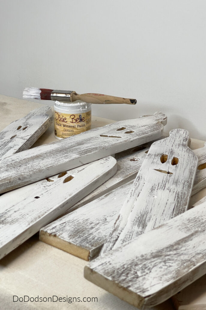 white painted wood ghosts