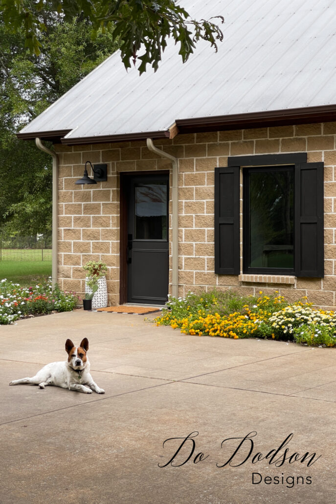 DIY wood shutters on brick house