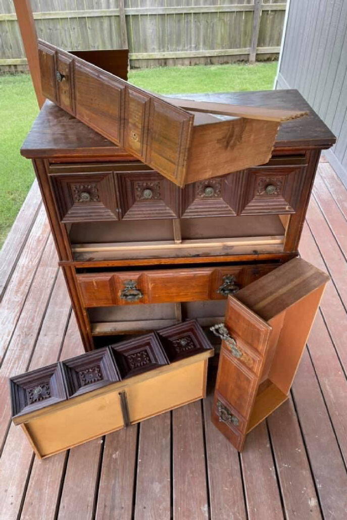 Janky Facebook Marketplace dresser with damaged and missing drawers before a complete secondhand furniture makeover.